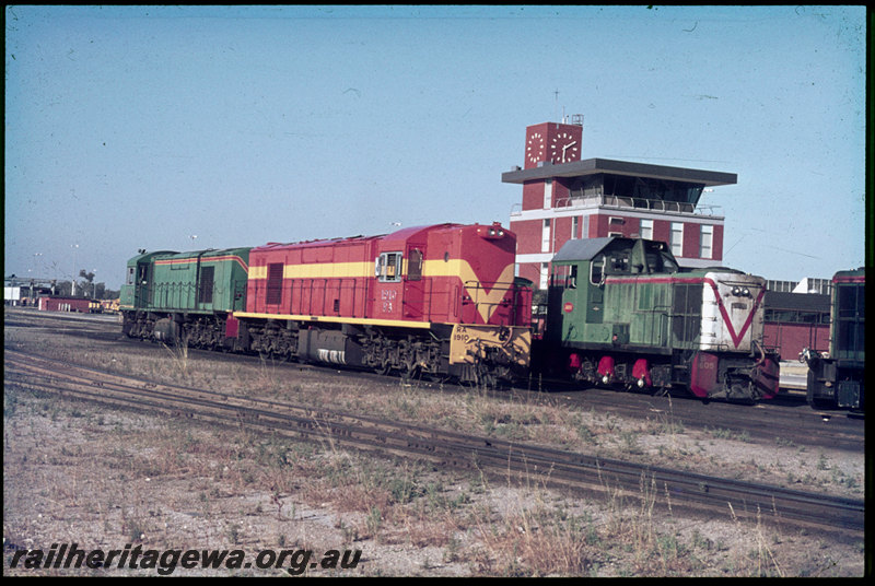 T06866
RA Class 1910, International Orange livery, R Class 1904, B Class 1605, Yardmasters Building, clock tower, Forrestfield
