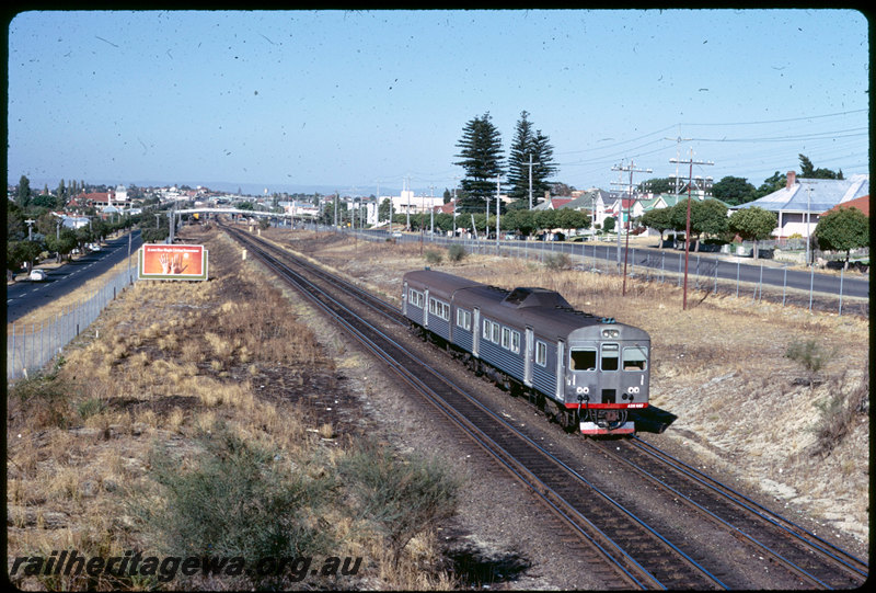 T06884
ADK Class 687 railcar with ADB Class trailer, Up suburban passenger service, between Maylands and Mount Lawley, Seventh Avenue road bridge, ER line

