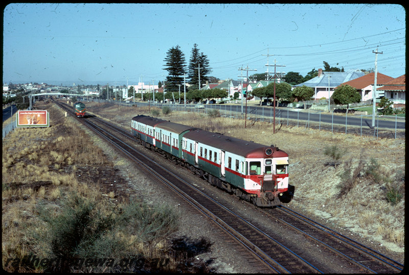 T06886
ADG/AYE/ADG Class railcar set, Up suburban passenger service, unidentified X Class, Down light engine movement, between Maylands and Mount Lawley, Seventh Avenue road bridge, ER line
