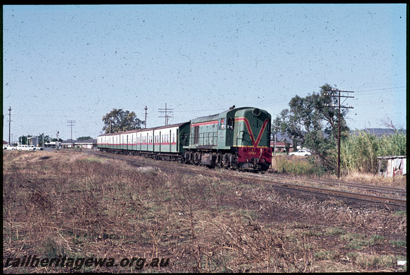 T06897
C Class 1701, Down suburban passenger service, departing Stokely, SWR line
