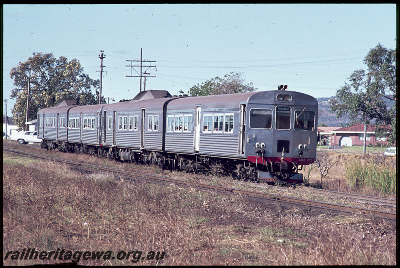 T06901
ADB Class 772 leading ADK/ADB/ADK Class railcar set, Down suburban passenger service, departing Stokely, Albany Highway level crossing, SWR line
