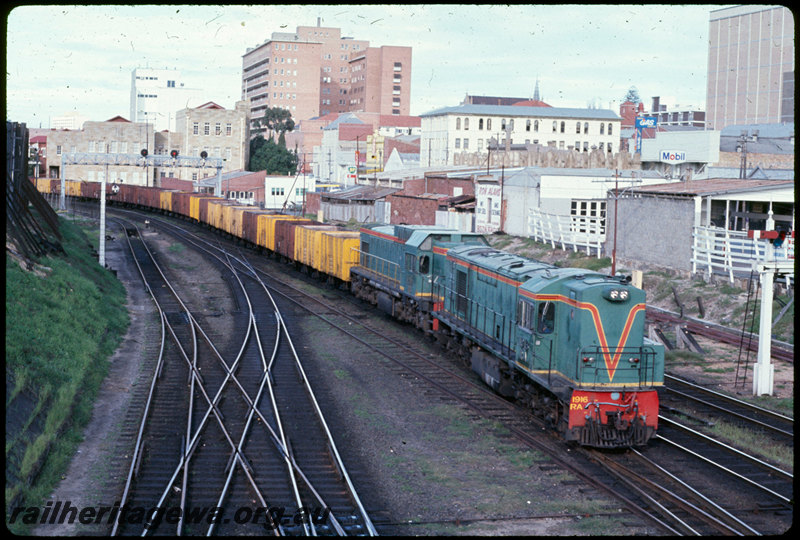 T06958
RA Class 1916, Up goods train, AB Class 1531 dead attached, Perth, signal gantry, searchlight signals, semaphore bracket signal, photo taken from Barrack Street bridge, ER line
