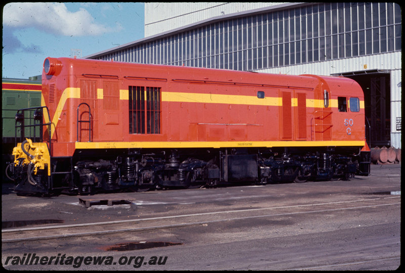 T06974
G Class 50, freshly outshopped in International Orange livery, Forrestfield Loco Depot, workshop building
