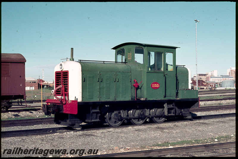 T07001
Z Class 1153, East Perth Power Station shunter, hand operated fuel pump visible on long-hood, transfer sidings, DA Class van
