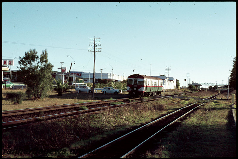 T07072
ADG Class 614, single railcar, Up suburban passenger service, between Cottesloe and Mosman Park, Salvado Street level crossing, Mosman Park station in background, ER line
