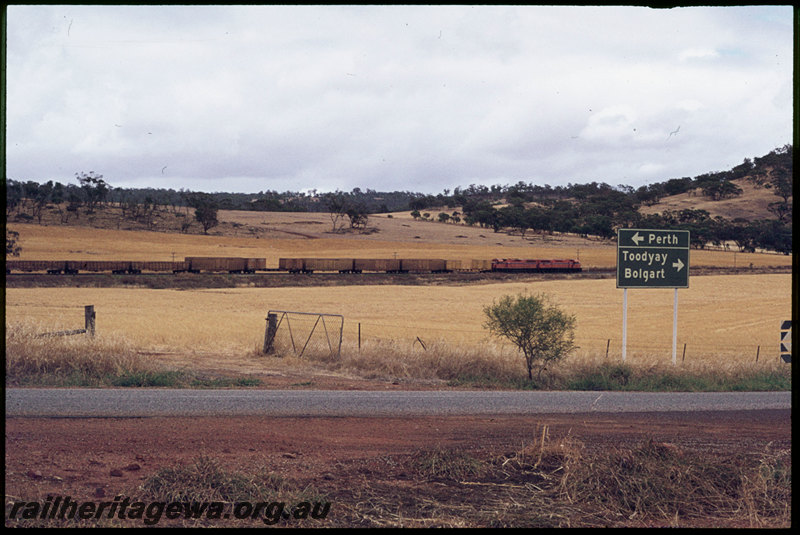 T07201
Double headed L Class, second loco is L Class 256, Up goods train, between Lloyd's Crossing and Toodyay, Toodyay Road in foreground, ER line

