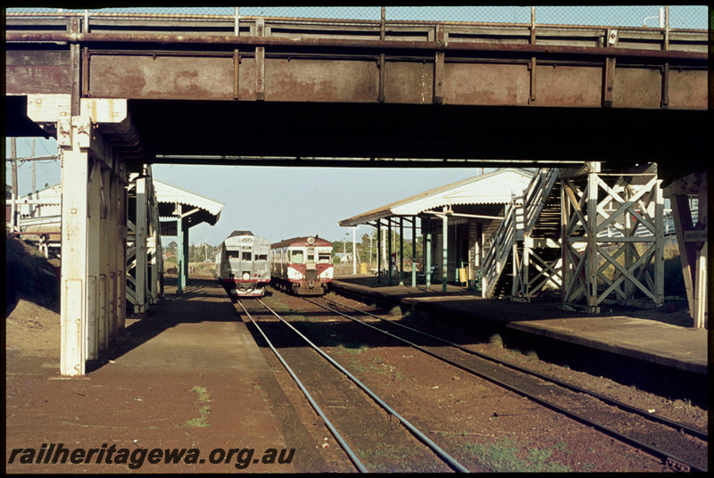 T07209
ADG Class railcar set, Up suburban passenger service, ADB/ADK Class railcar set, Down suburban passenger service, Swanbourne, platform, station buildings, footbridge, Claremont Crescent Bridge, ER line 
