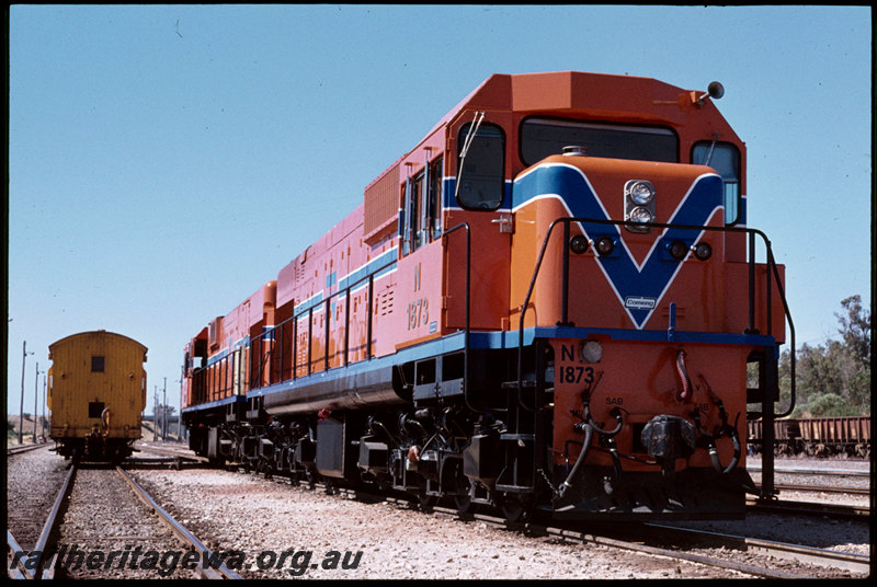 T07239
Brand new N Class 1873 with an unidentified N Class, Z Class brakevan, Kwinana, FM line
