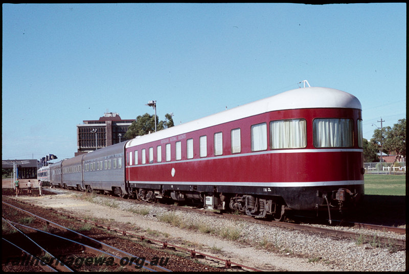 T07281
The Royal Silver Jubilee Exhibition train, Australian National Railways EI Class 84 observation carriage, Indian Pacific carriages, carriages converted from ex-NSWGR 1200 Class Tulloch railcars, dock platform, Perth Terminal, East Perth, point rodding, canopy, Westrail Centre, ER line
