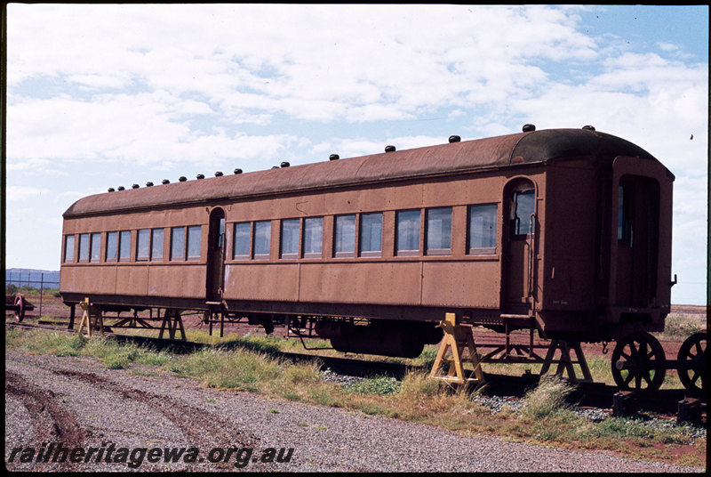 T07290
Ex-NSWGR FS Class carriage, painted in undercoat, mounted on stands without bogies, preserved at Pilbara Railway Historical Society, Six Mile Museum, Dampier
