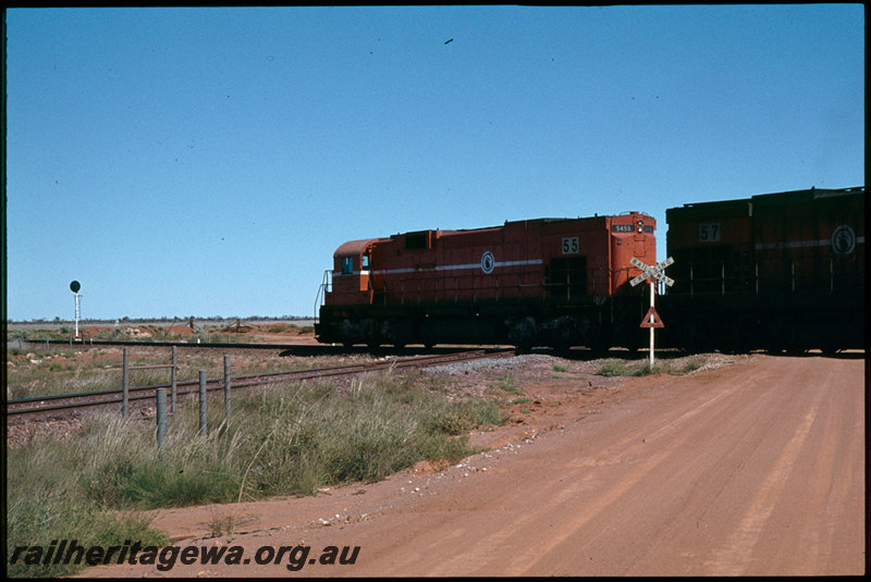 T07310
Mount Newman Mining ALCo C636 5455 and 5457, empty iron ore train, Newgold Crossing, Mount Newman Railway at-grade crossing with Goldsworthy Railway, near Port Hedland, Pilbara
