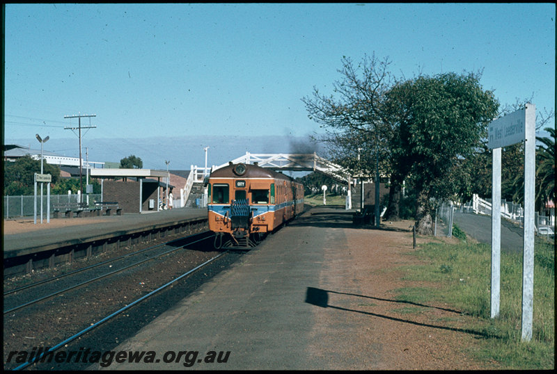 T07401
ADA/ADX Class railcar set, Down suburban passenger service, West Leederville, platform, station sign, shelters, footbridge, ER line
