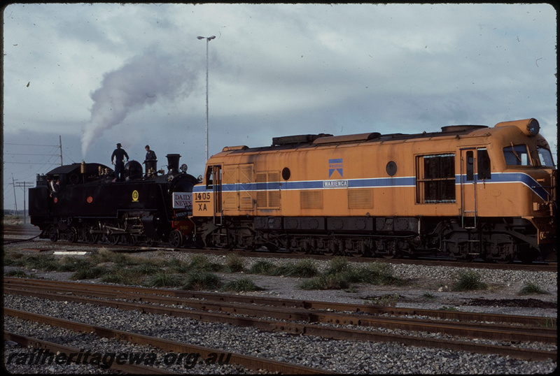 T08082
DD Class 592, taking water, headboards, XA Class 1405 