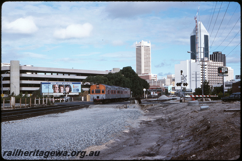 T08668
ADC/ADL Class railcar set, Down suburban passenger service, between City and Claisebrook, Lord Street level crossing, ER line
